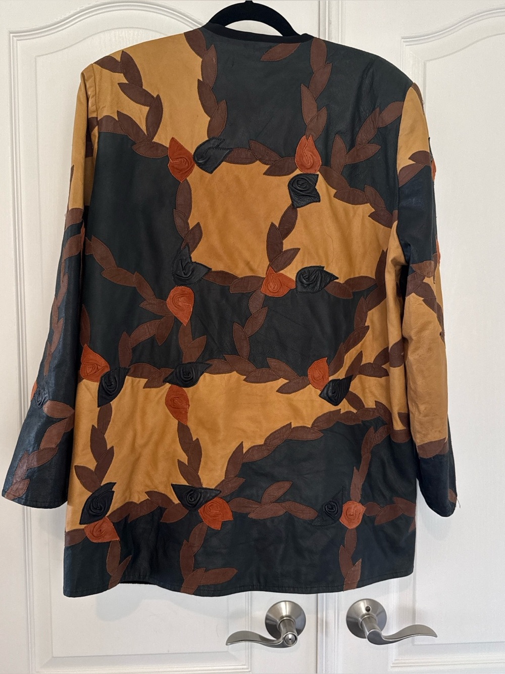 Vintage Art-to-Wear leather Floral Appliqué Jacket with brown and orange leaf